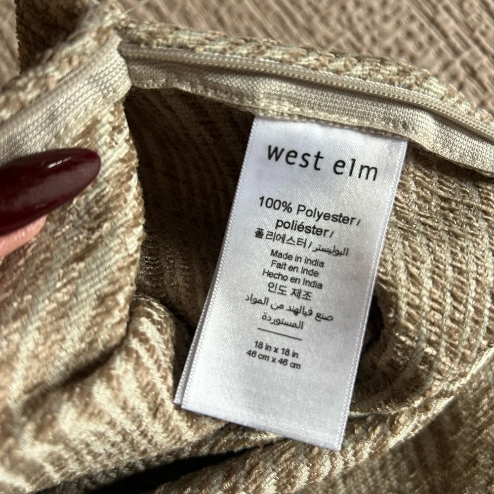 West Elm warm grayish purple textured pillow from last season 18 by 18